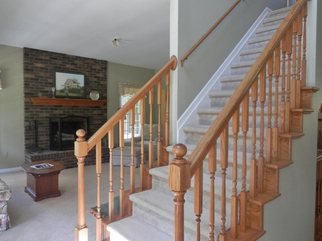 22296 Benton Road Mesick, MI 49668 - Photo 5 of 56 Open staircase with living room beyon