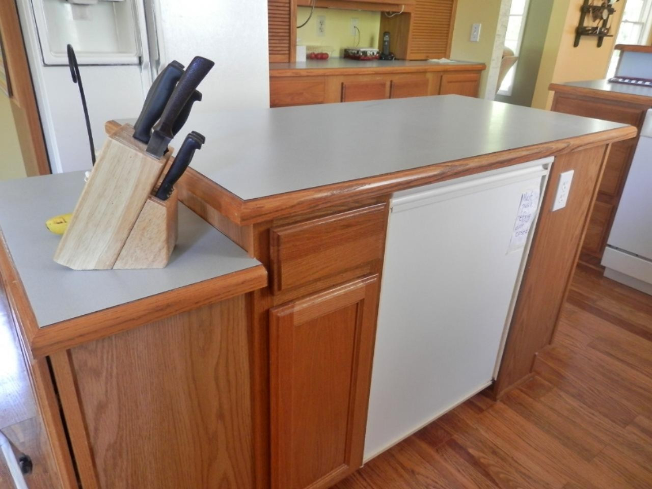 22296 Benton Road Mesick, MI 49668 - Photo 10 of 56 Extra refrigerator under island
