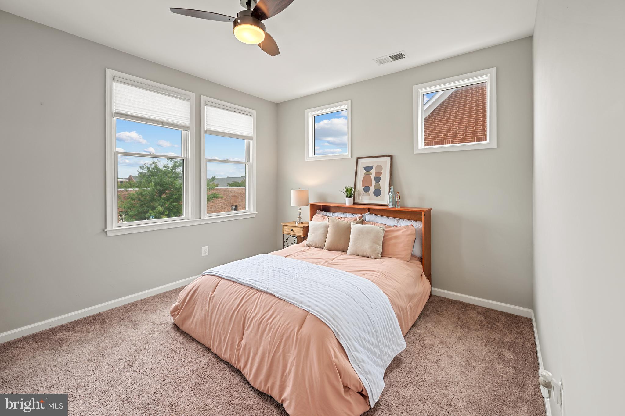 8459 Reformatory Way Lorton, VA 22079 - Photo 41 of 78 a bedroom with a bed and window