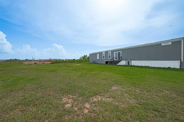 a house view with a garden space