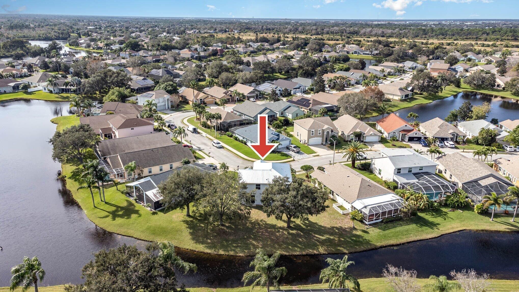 964 Shaw Circle Melbourne, FL 32940 - Photo 12 of 54 an aerial view of residential houses with outdoor space