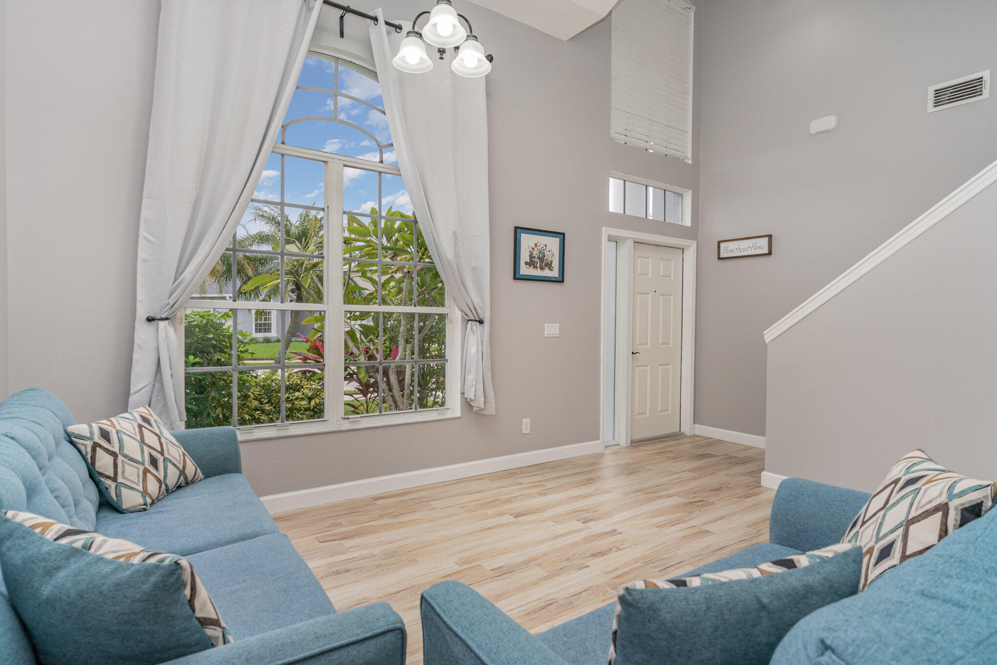 964 Shaw Circle Melbourne, FL 32940 - Photo 17 of 54 a living room with furniture and a window