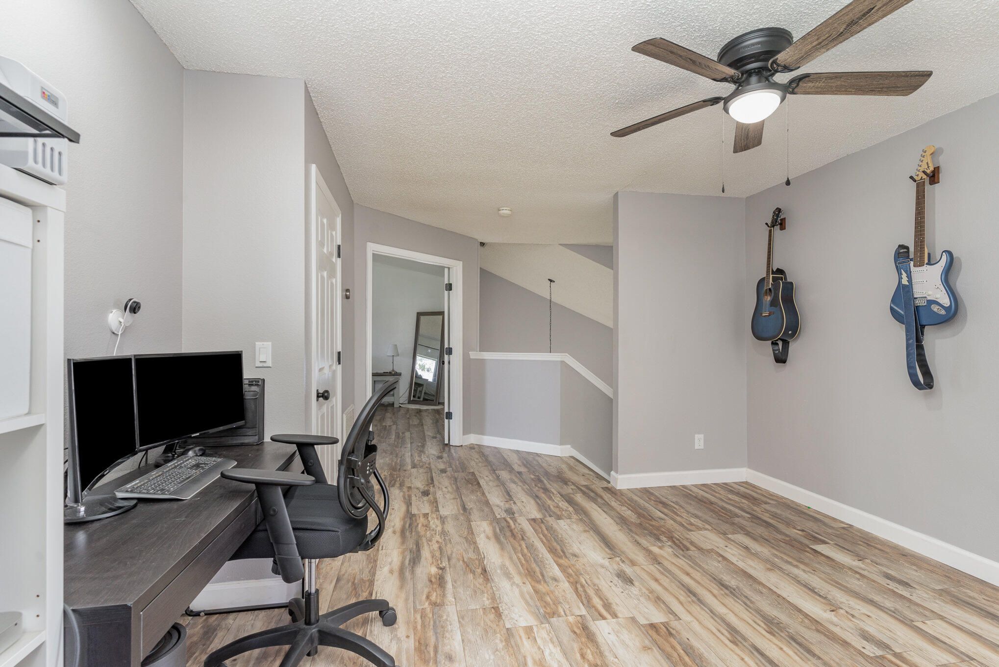 964 Shaw Circle Melbourne, FL 32940 - Photo 24 of 54 a workspace with a chandelier