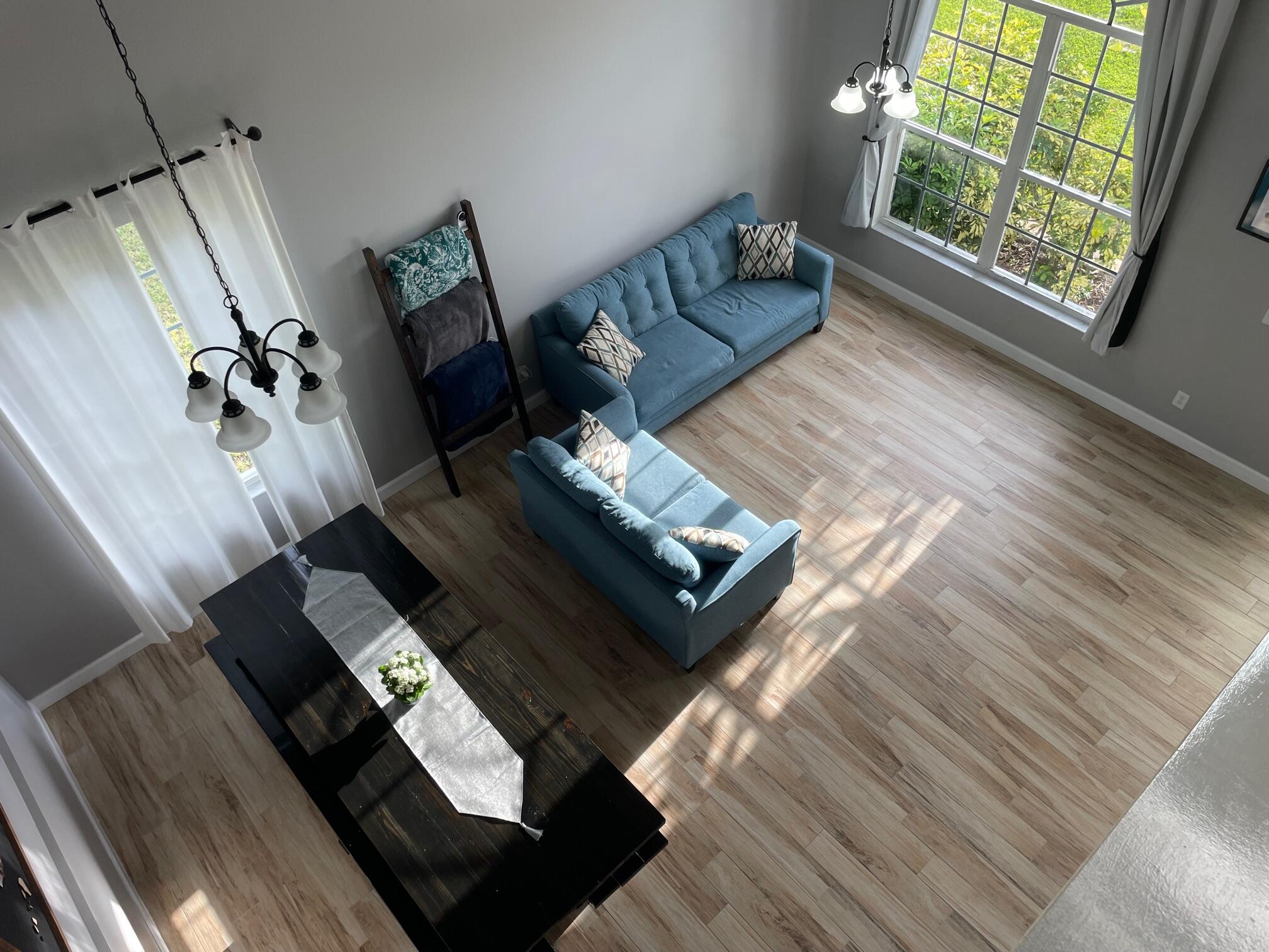 964 Shaw Circle Melbourne, FL 32940 - Photo 30 of 54 a living room with chairs