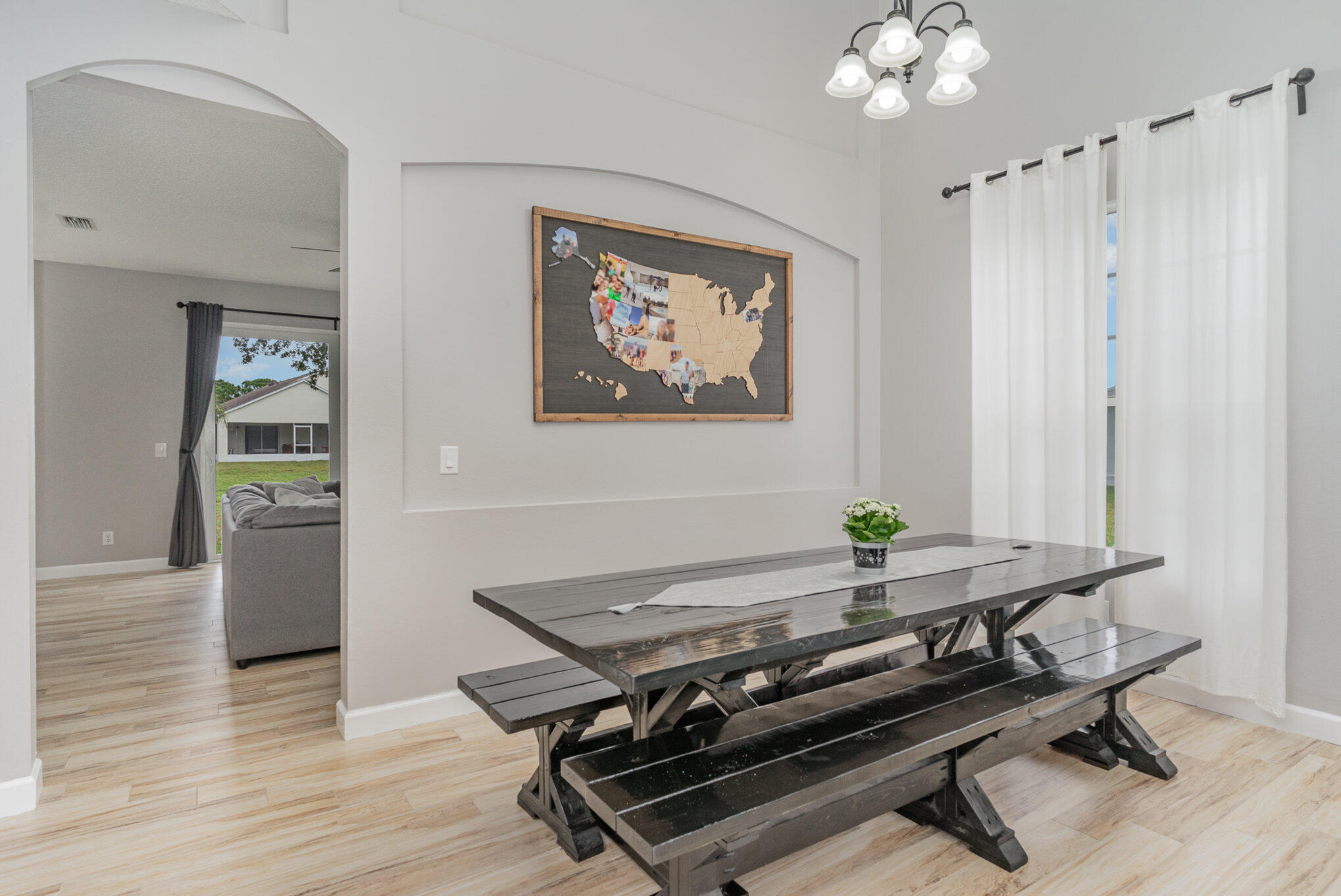 964 Shaw Circle Melbourne, FL 32940 - Photo 32 of 54 a room with wooden floor and window