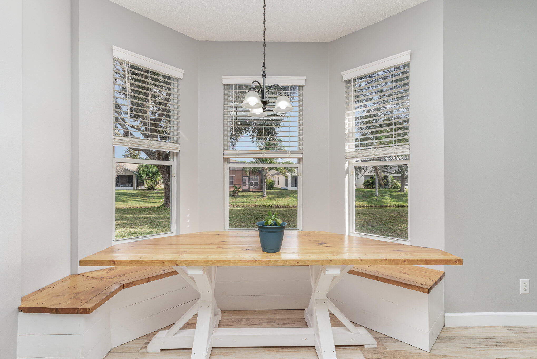 964 Shaw Circle Melbourne, FL 32940 - Photo 38 of 54 a kitchen with a table and chairs in it