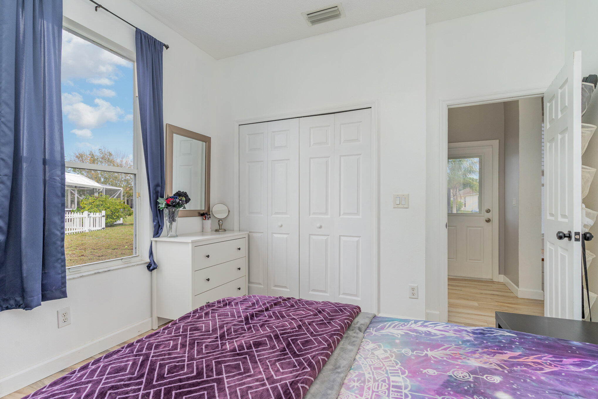 964 Shaw Circle Melbourne, FL 32940 - Photo 41 of 54 a bedroom with a bed and a window