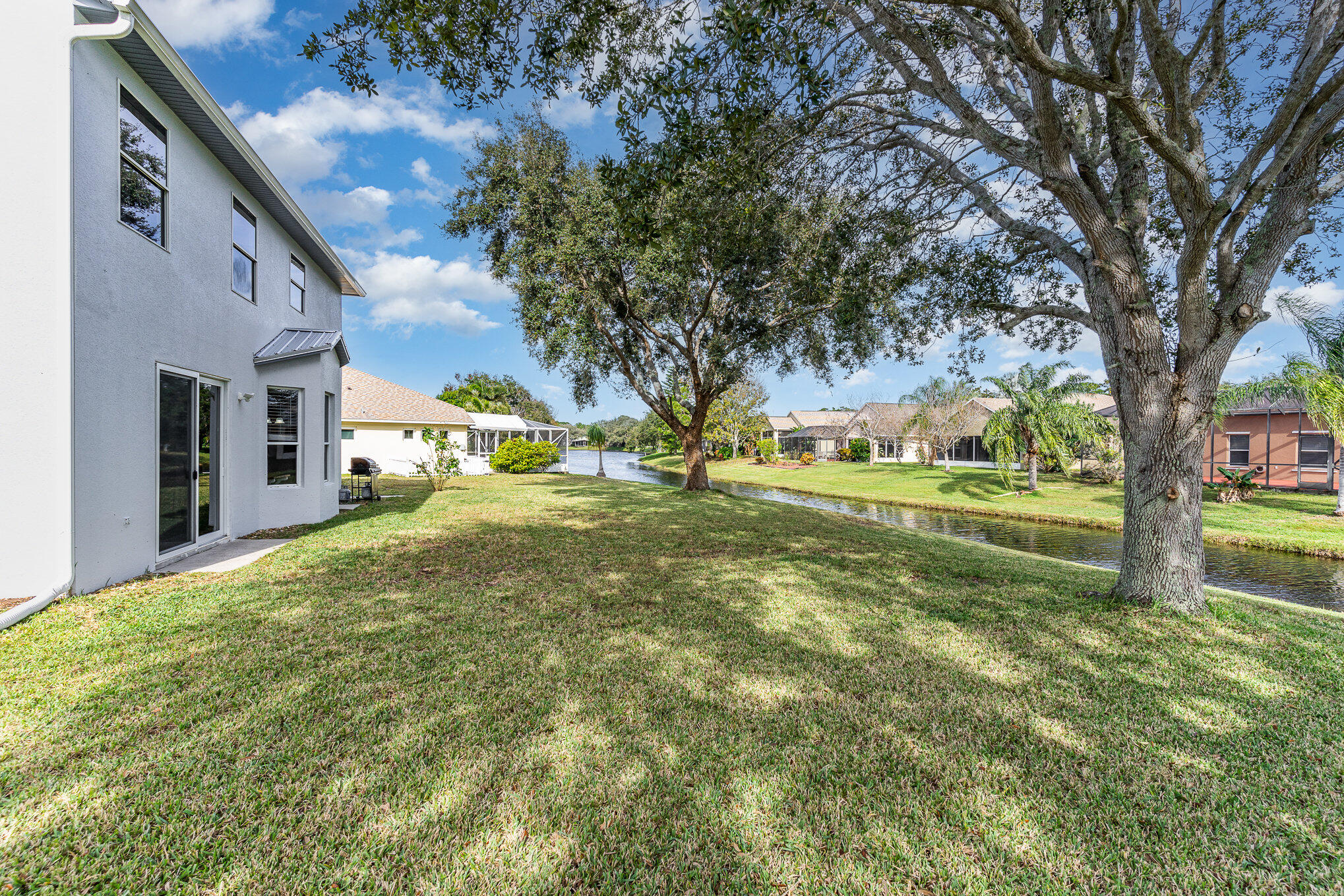 964 Shaw Circle Melbourne, FL 32940 - Photo 44 of 54 a view of a house with a yard