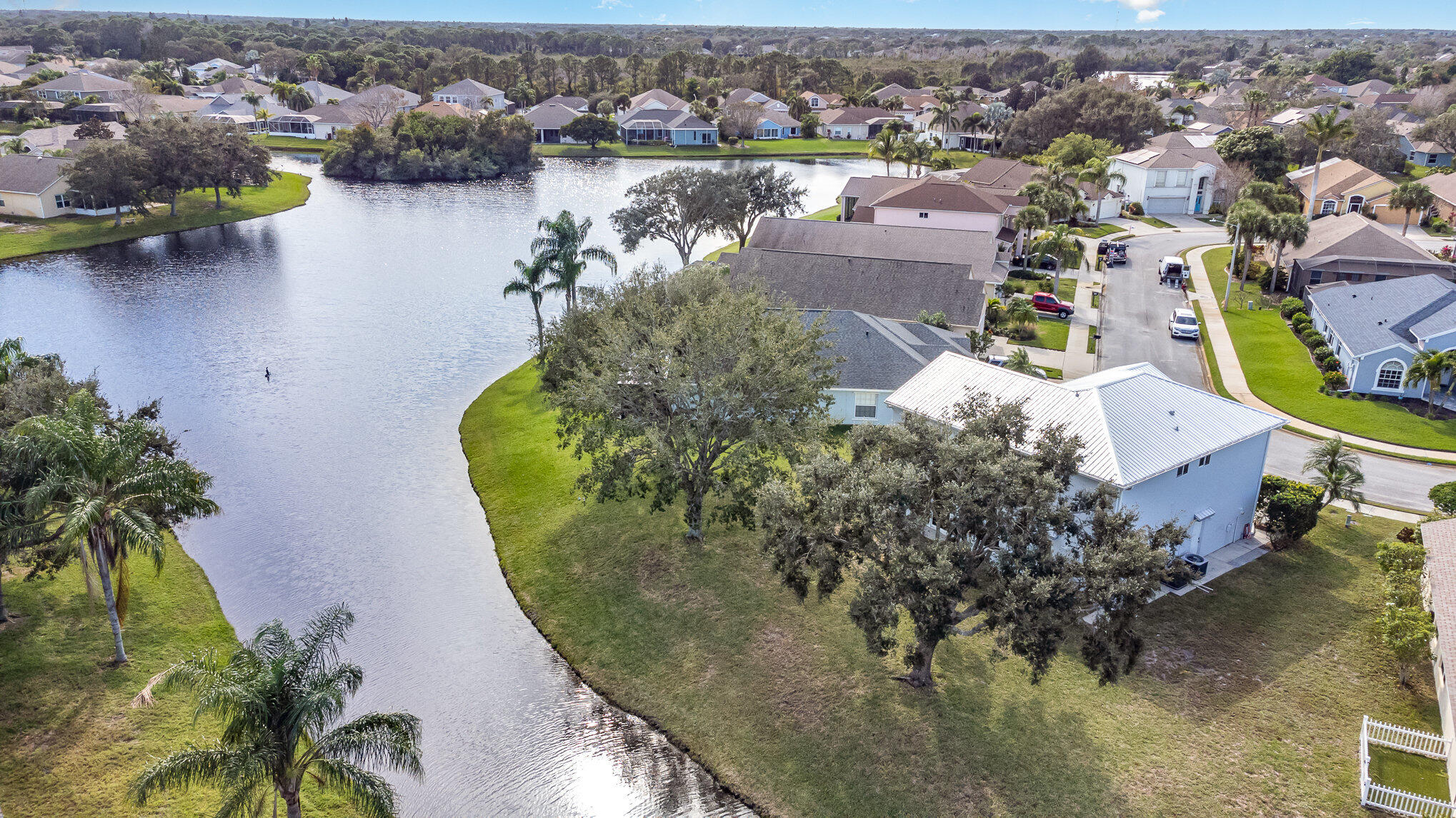 964 Shaw Circle Melbourne, FL 32940 - Photo 46 of 54 an aerial view of a house with outdoor space and lake view