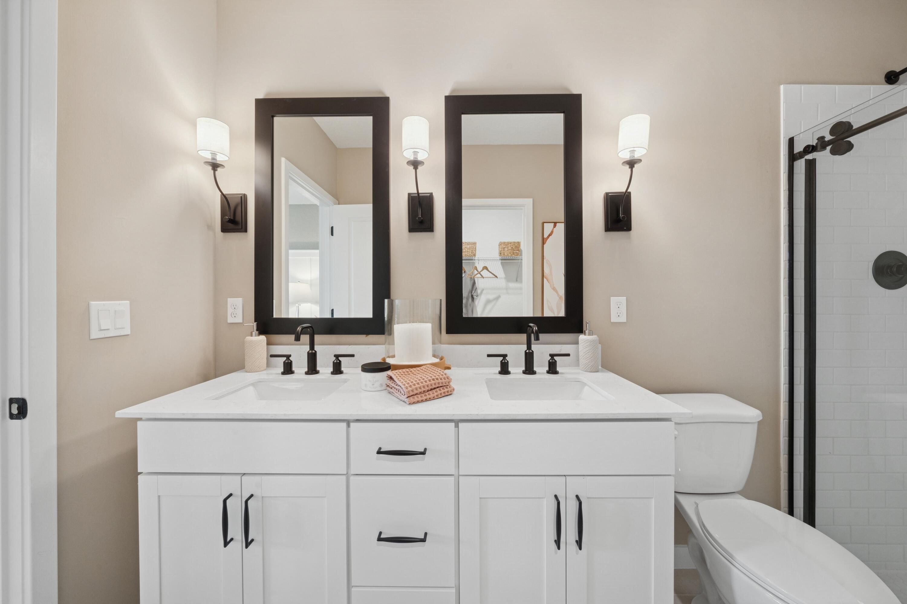 9732 Apollo Avenue, Unit 4 Fort Pierce, FL 34945 - Photo 35 of 39 a bathroom with a sink and a mirror