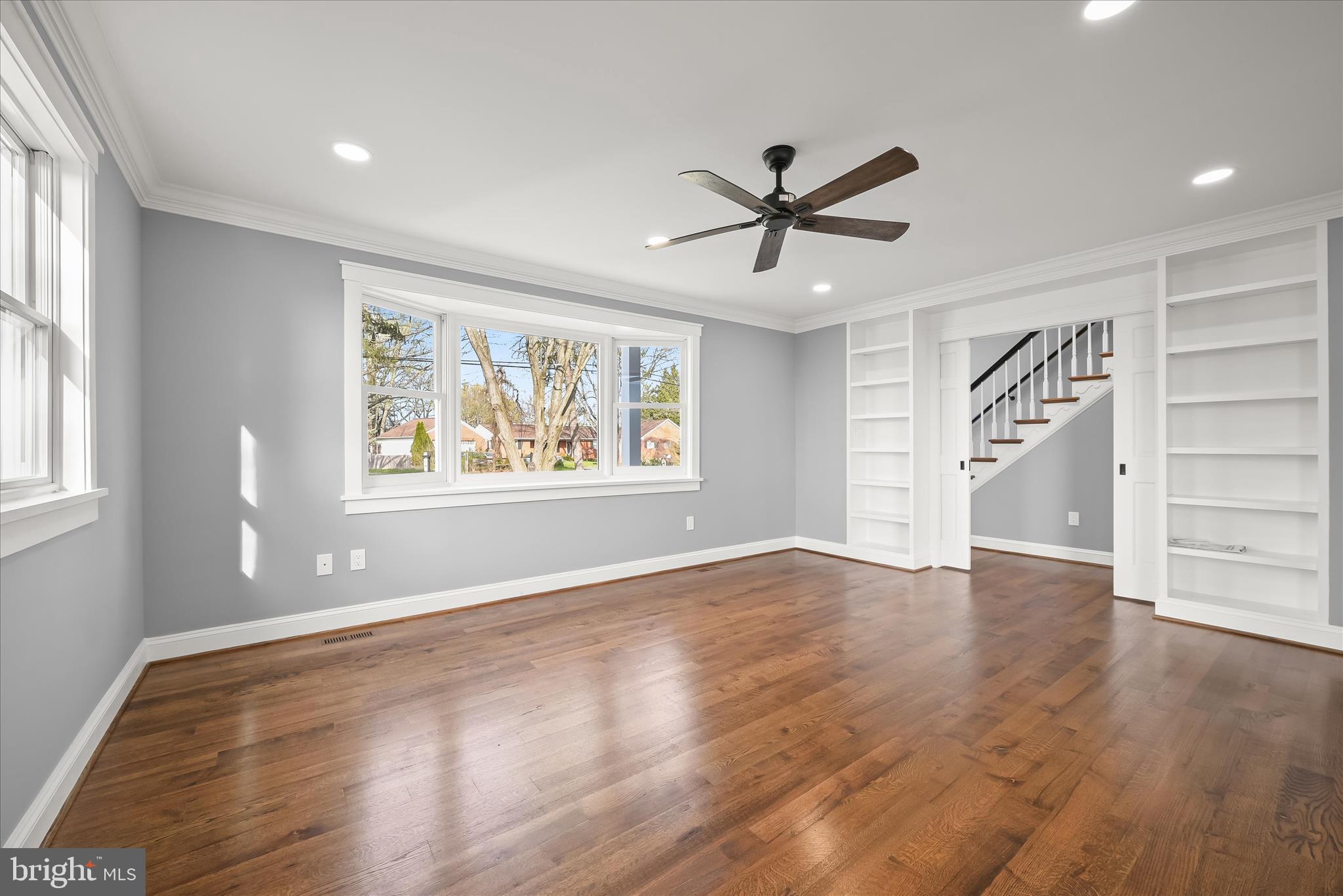21611 Slidell Road Boyds, MD 20841 - Photo 13 of 84 a view of empty room with wooden floor and window