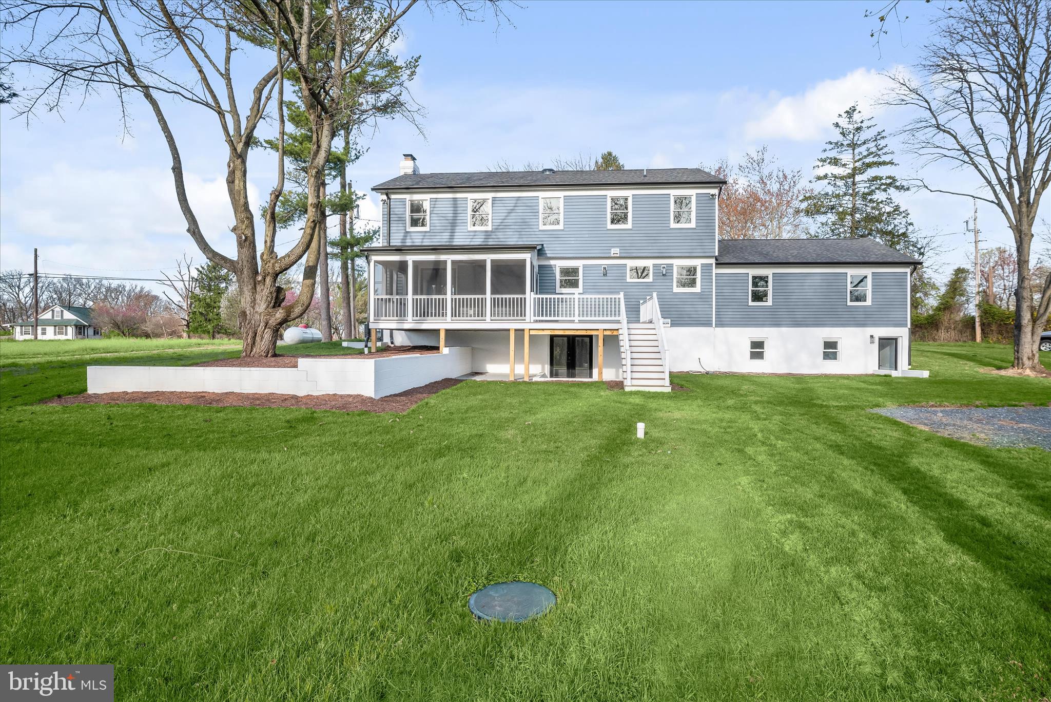 21611 Slidell Road Boyds, MD 20841 - Photo 2 of 84 a view of a house with a yard and sitting area
