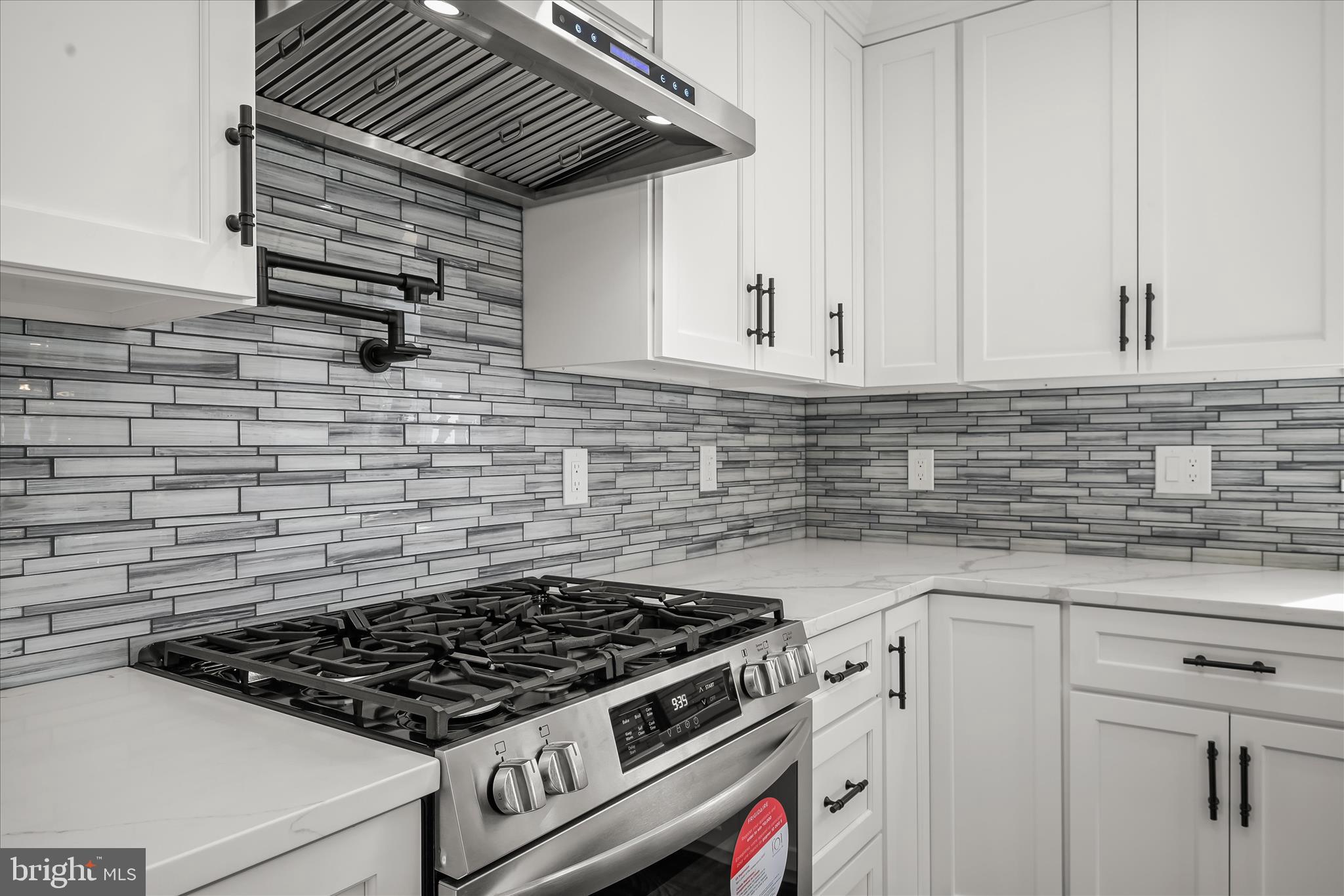 21611 Slidell Road Boyds, MD 20841 - Photo 30 of 84 Gas stove & pot filler