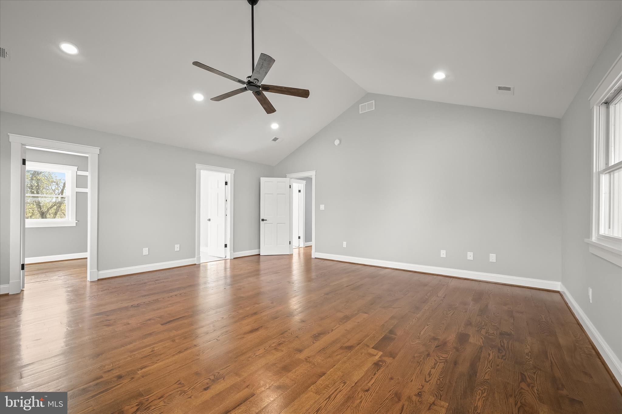 21611 Slidell Road Boyds, MD 20841 - Photo 41 of 84 a view of an empty room with wooden floor and a window