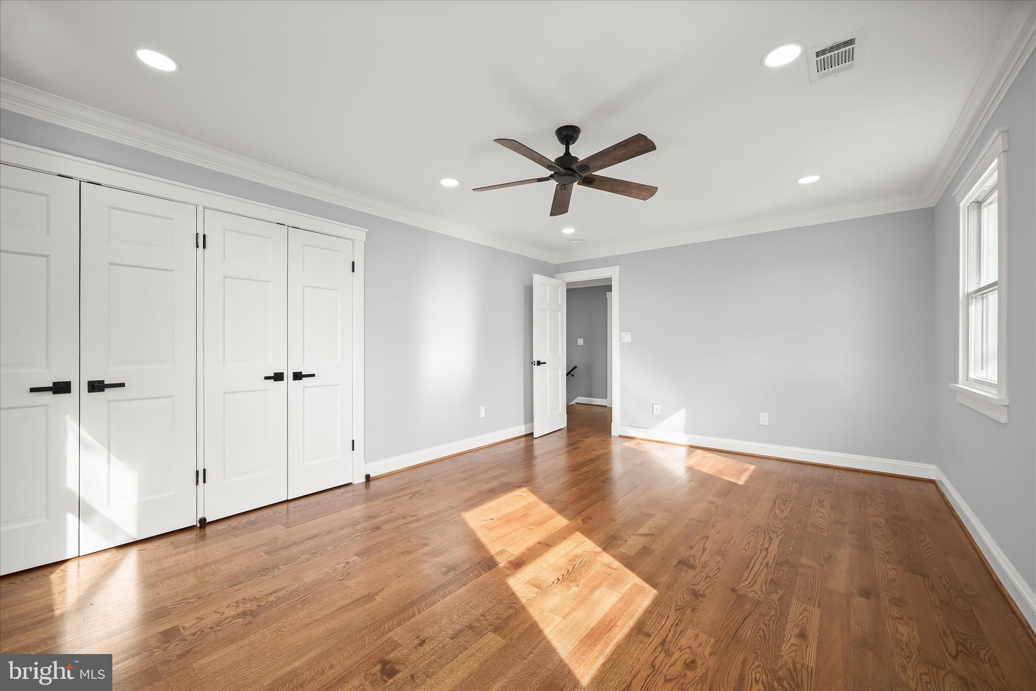 21611 Slidell Road Boyds, MD 20841 - Photo 52 of 84 a view of empty room with wooden floor and window