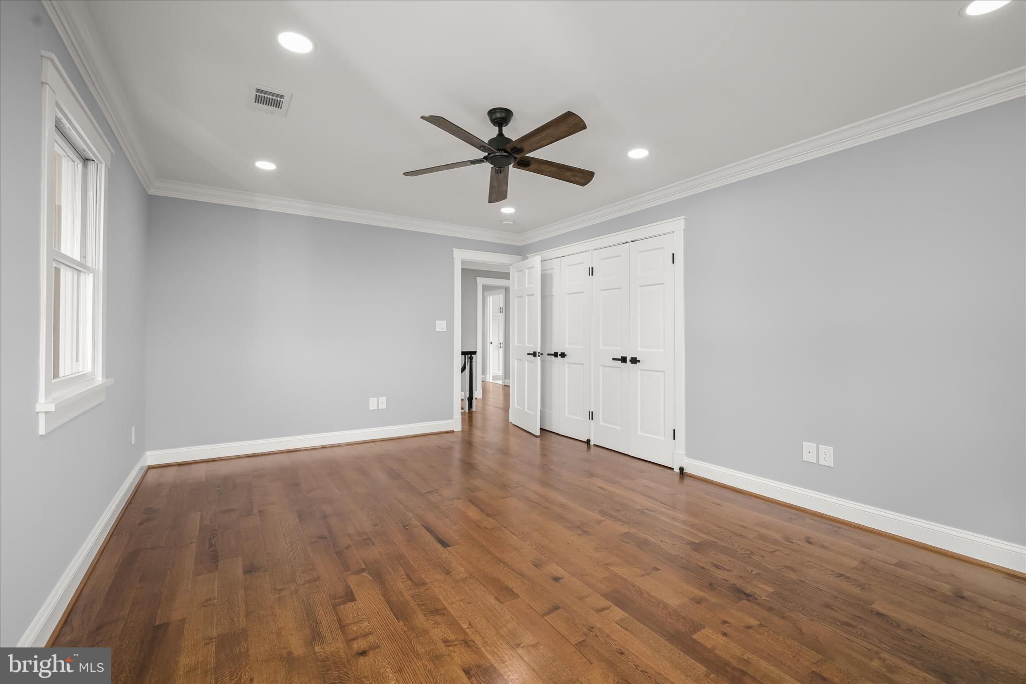 21611 Slidell Road Boyds, MD 20841 - Photo 57 of 84 wooden floor in an empty room with a window