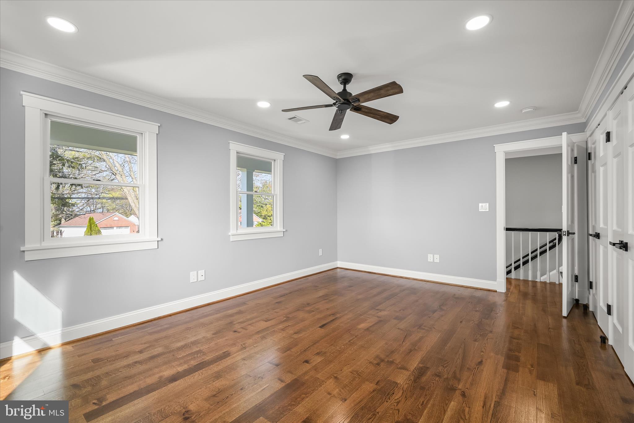21611 Slidell Road Boyds, MD 20841 - Photo 58 of 84 a view of empty room with wooden floor and fan