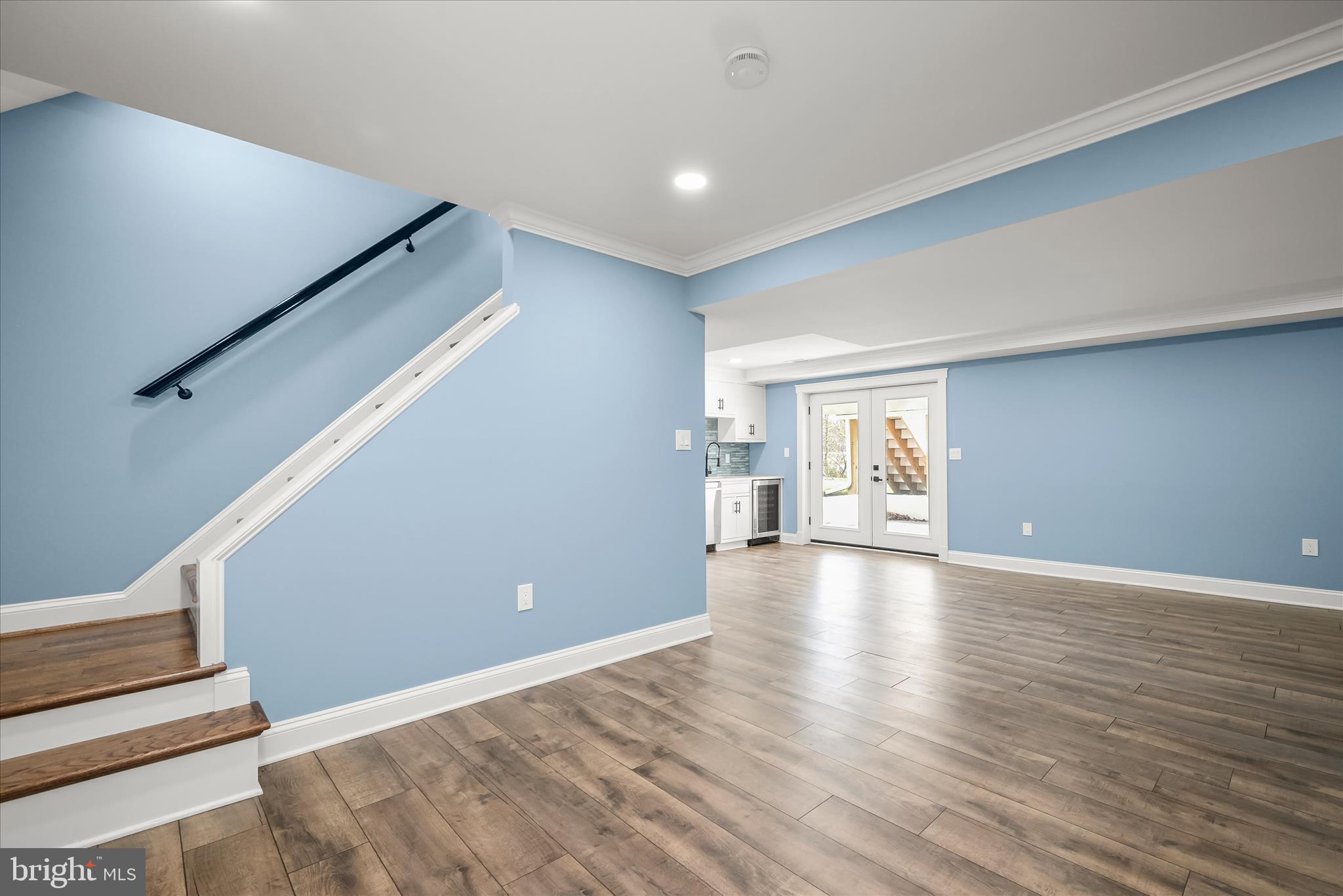 21611 Slidell Road Boyds, MD 20841 - Photo 59 of 84 a view of empty room with wooden floor and fan