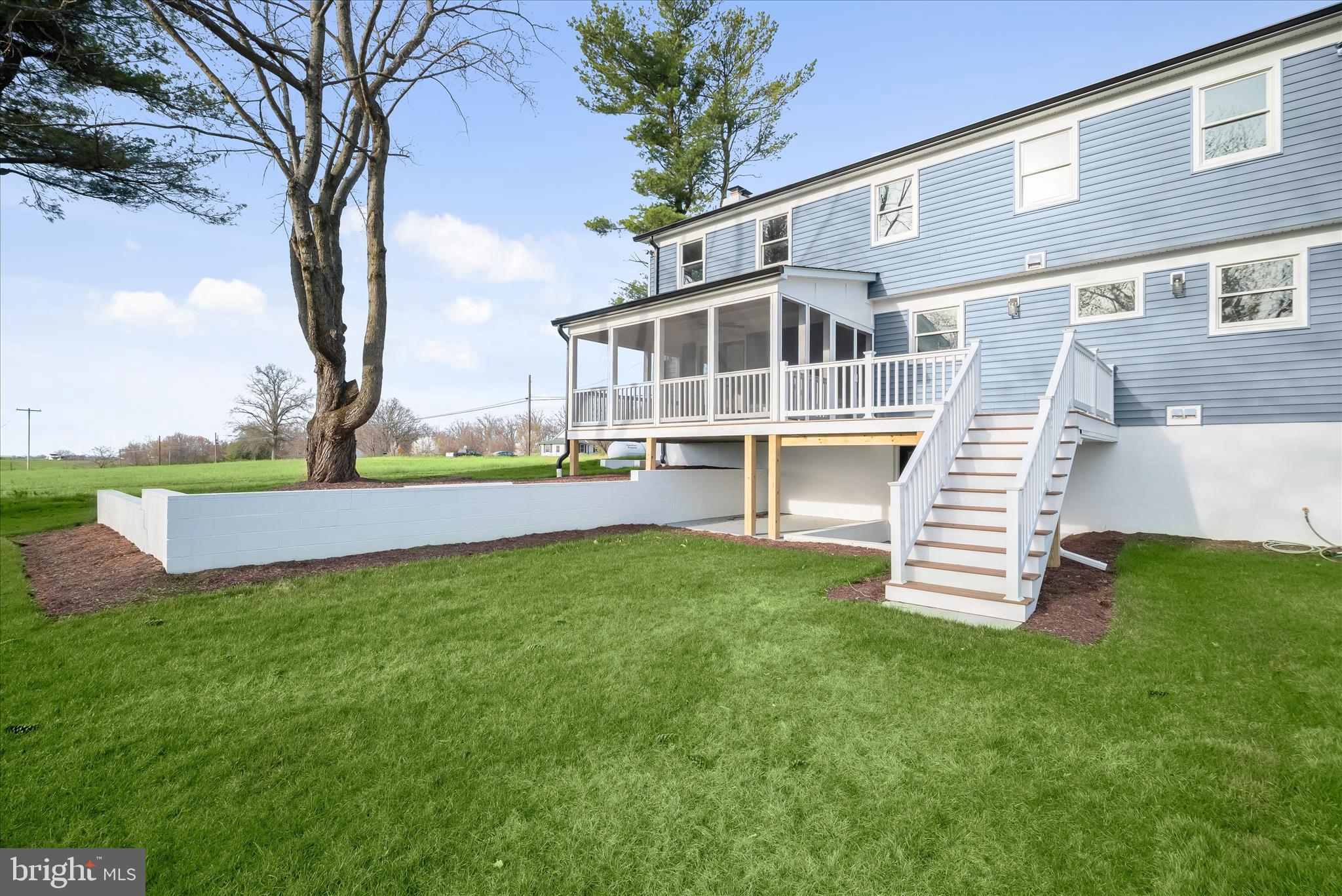 21611 Slidell Road Boyds, MD 20841 - Photo 75 of 84 a front view of a house with a garden and plants