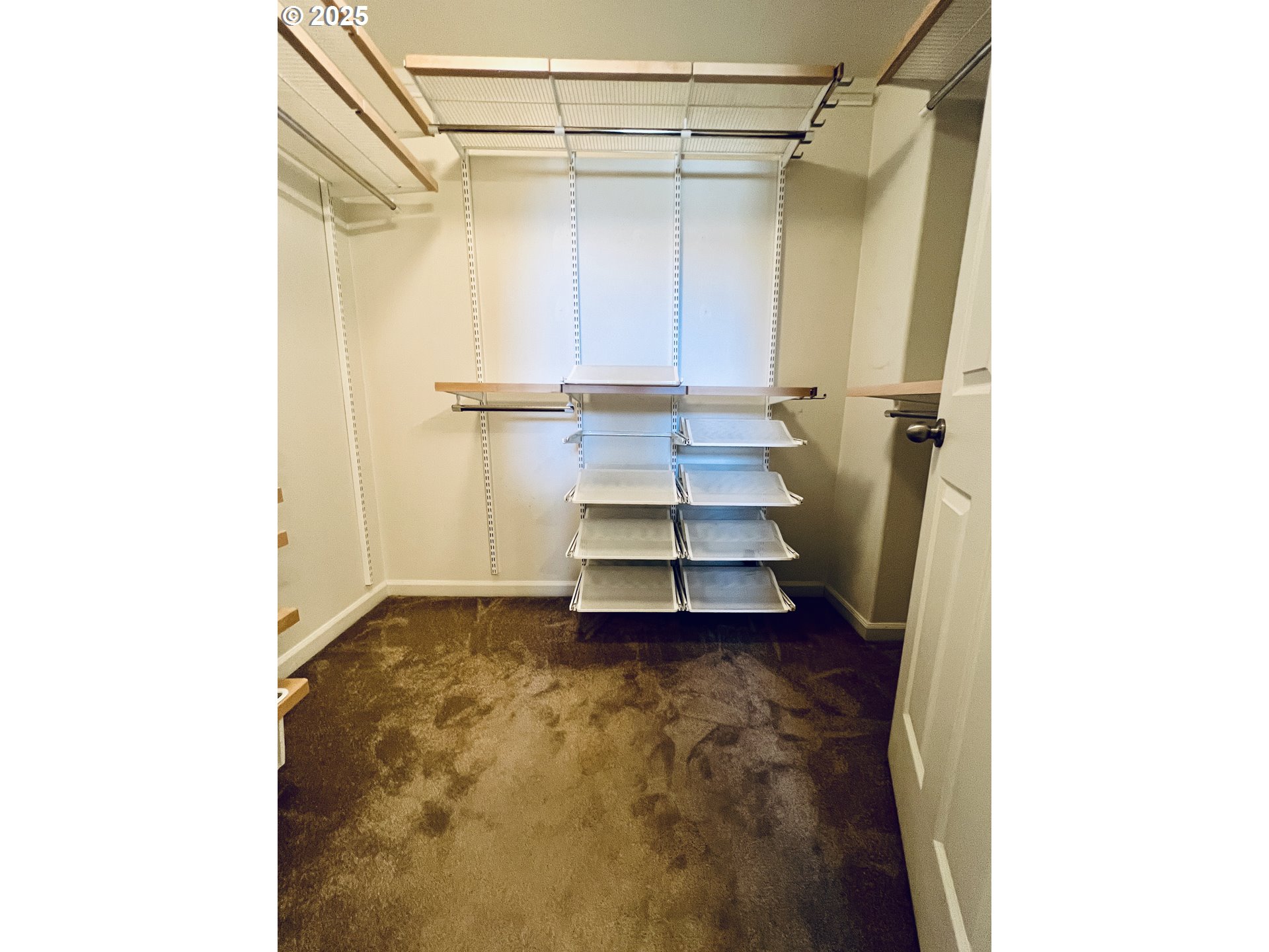 10723 Southwest Canterbury Lane, Unit 102 Portland, OR 97224 - Photo 22 of 30 a view of entryway with wooden floor