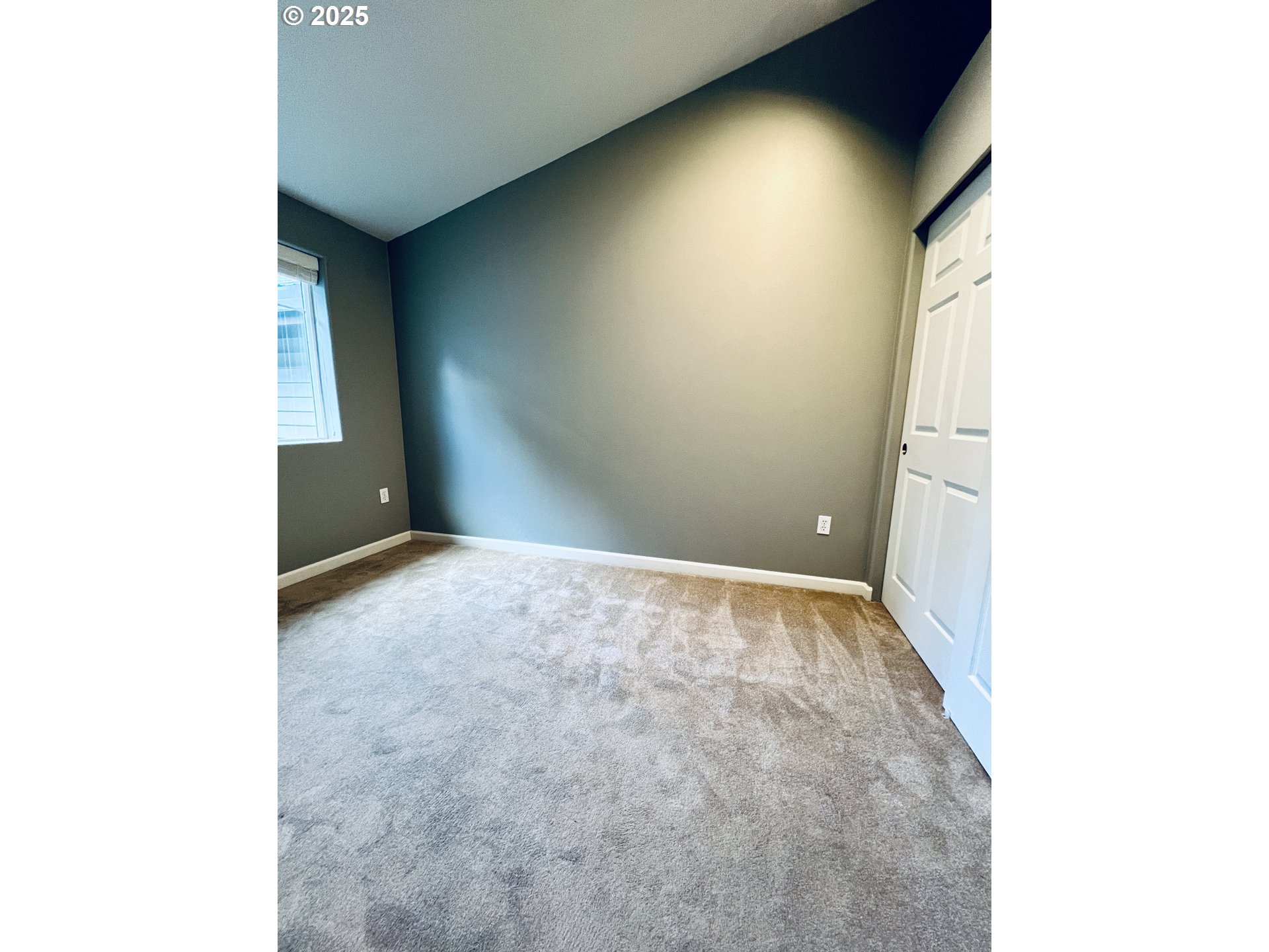 10723 Southwest Canterbury Lane, Unit 102 Portland, OR 97224 - Photo 26 of 30 a view of an empty room