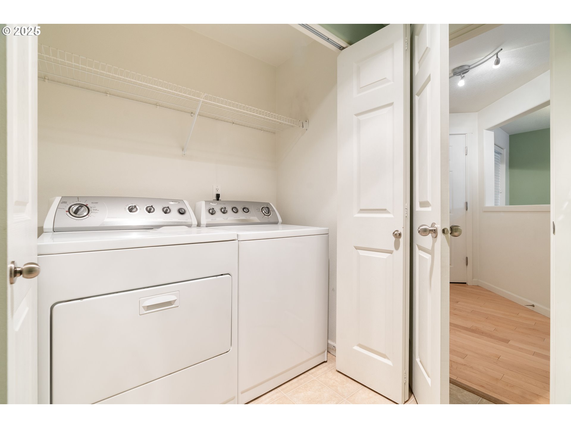 10723 Southwest Canterbury Lane, Unit 102 Portland, OR 97224 - Photo 29 of 30 a utility room with dryer and washer