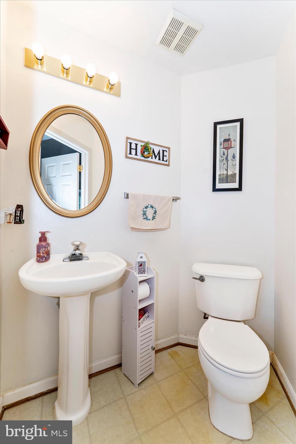 123 Jason's Ridge Smithsburg, MD 21783 - Photo 22 of 57 a bathroom with a sink mirror and toilet