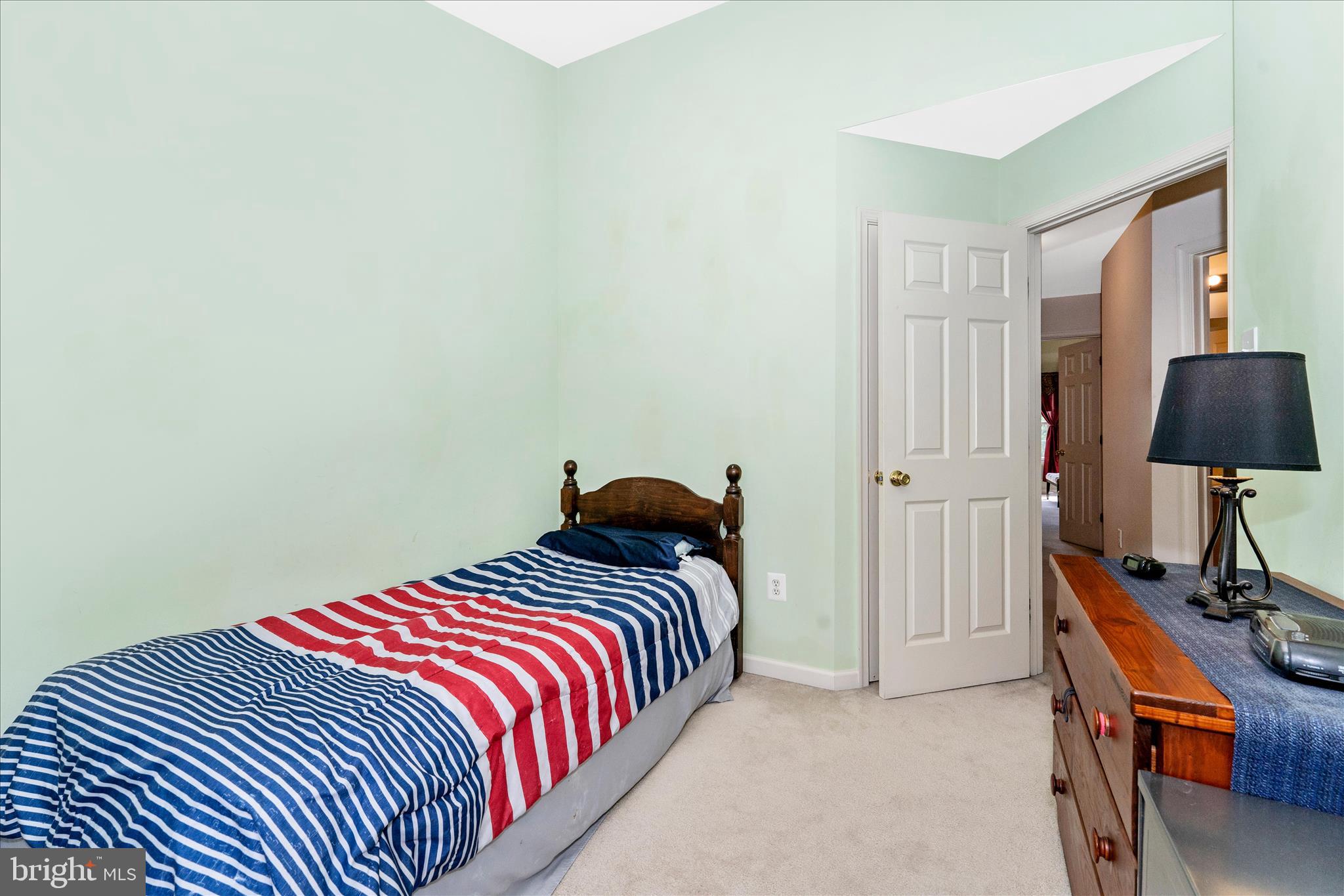 123 Jason's Ridge Smithsburg, MD 21783 - Photo 33 of 57 a bedroom with a bed and wooden floor
