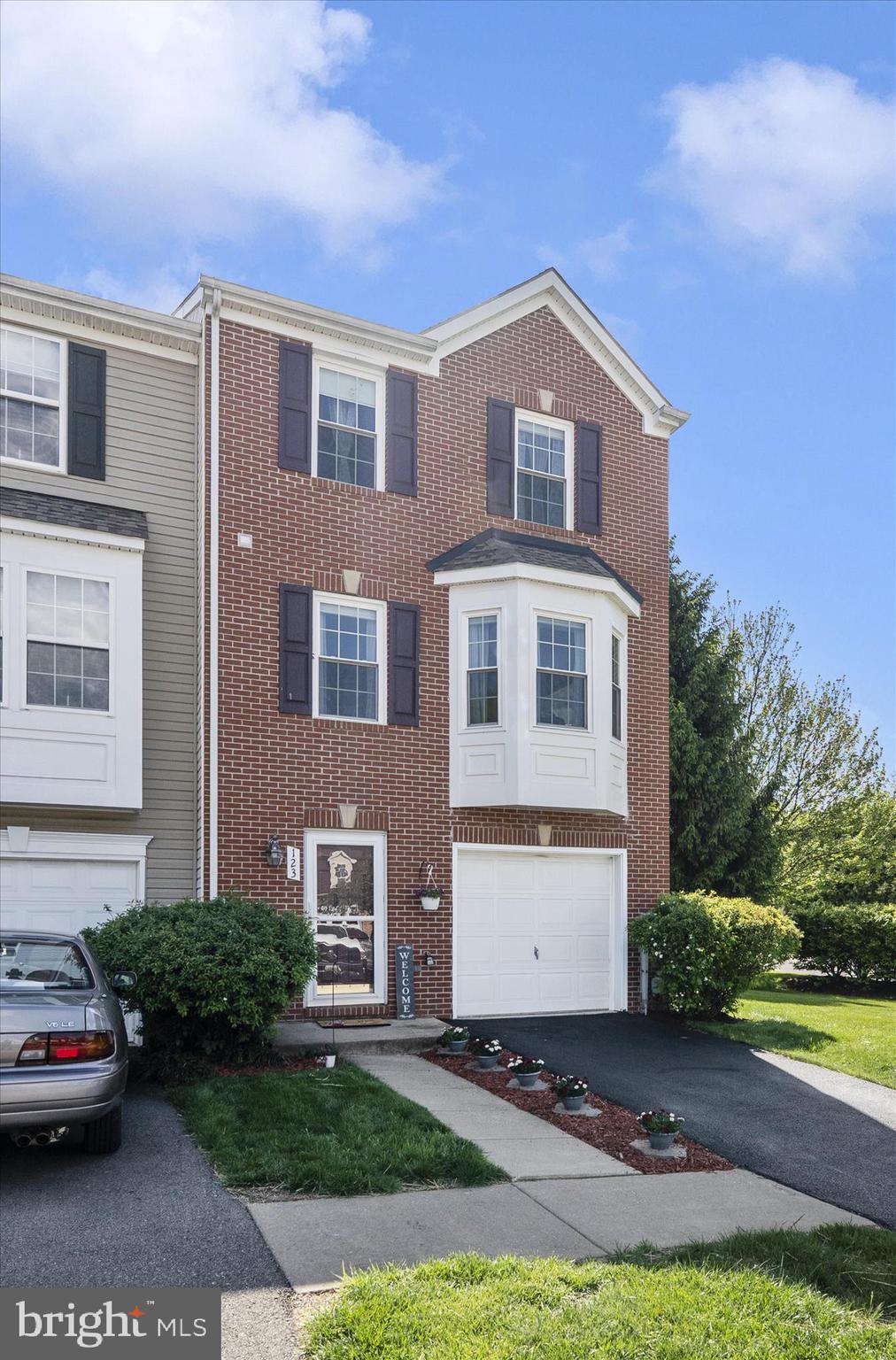 123 Jason's Ridge Smithsburg, MD 21783 - Photo 41 of 57 a front view of a house with a yard and garage