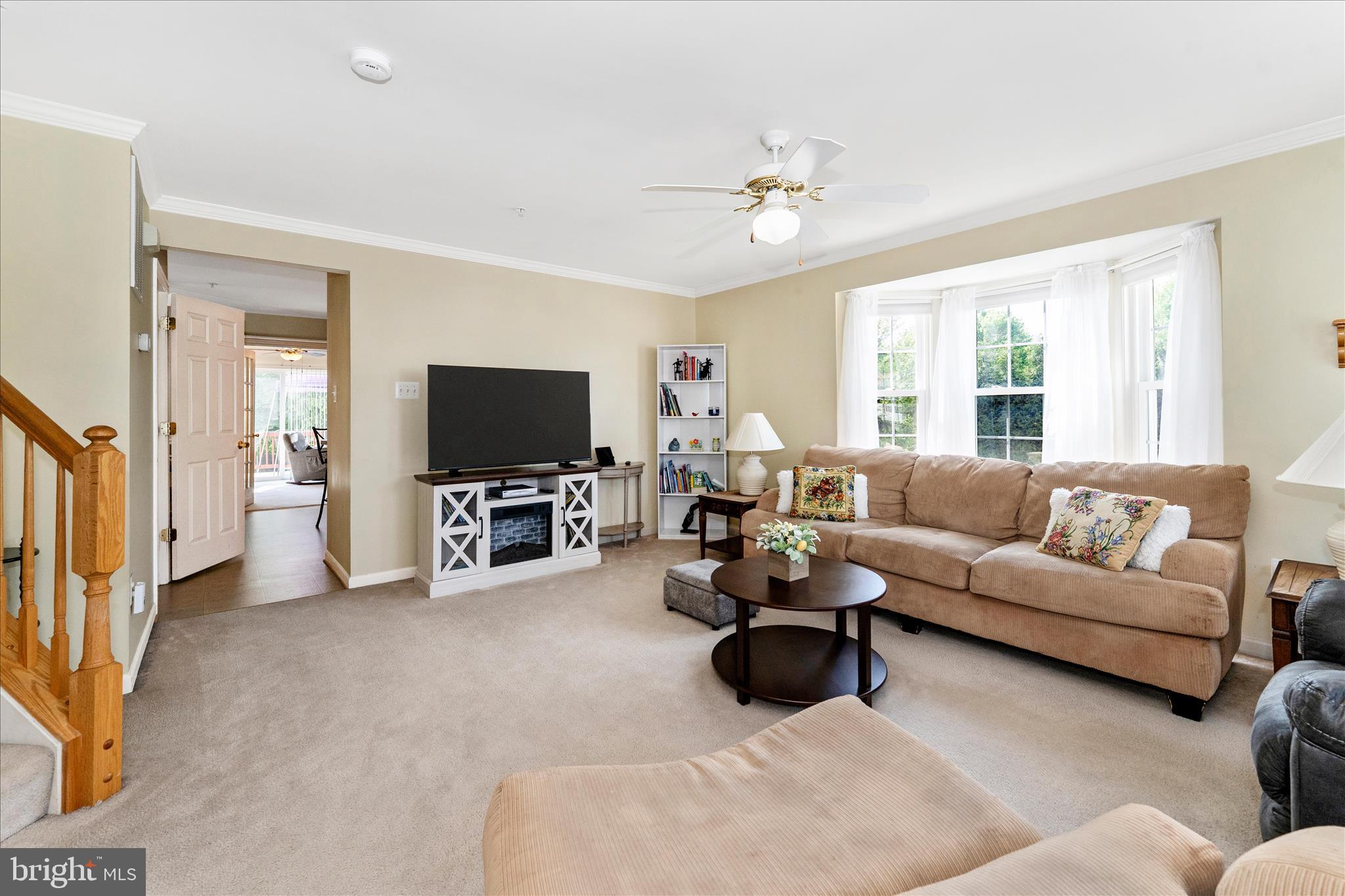 123 Jason's Ridge Smithsburg, MD 21783 - Photo 7 of 57 a living room with furniture and a flat screen tv