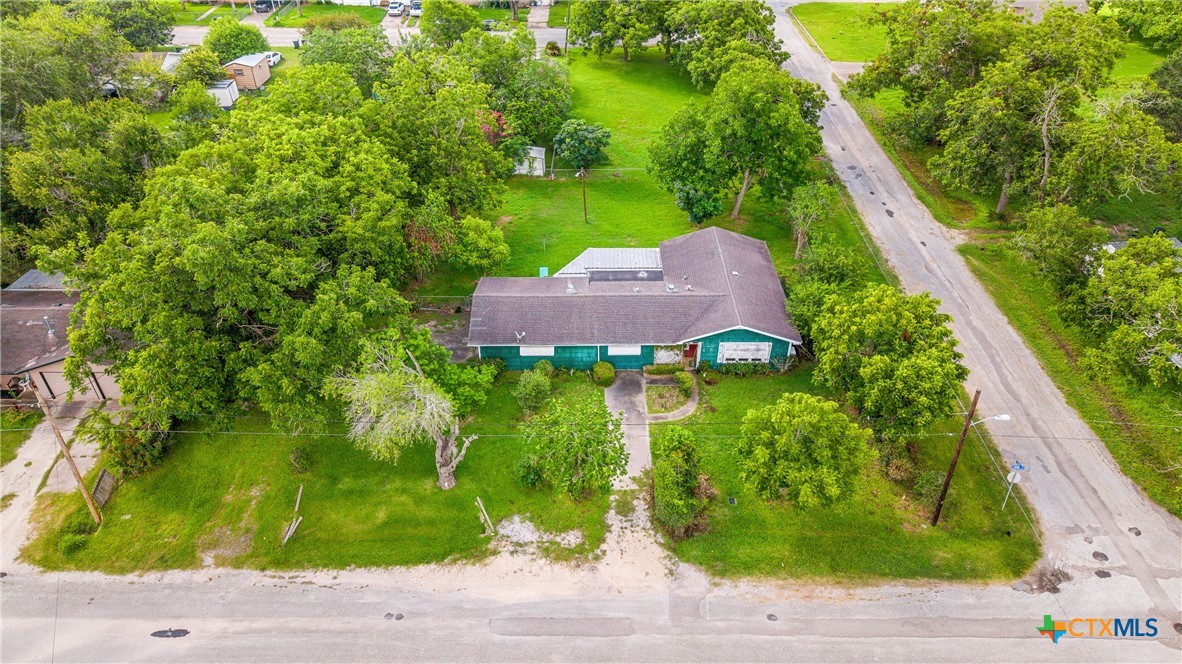 401 Kerr Street Edna, TX 77957 - Photo 1 of 23 a view of house with a yard