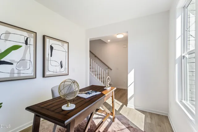 a view of a workspace with furniture
