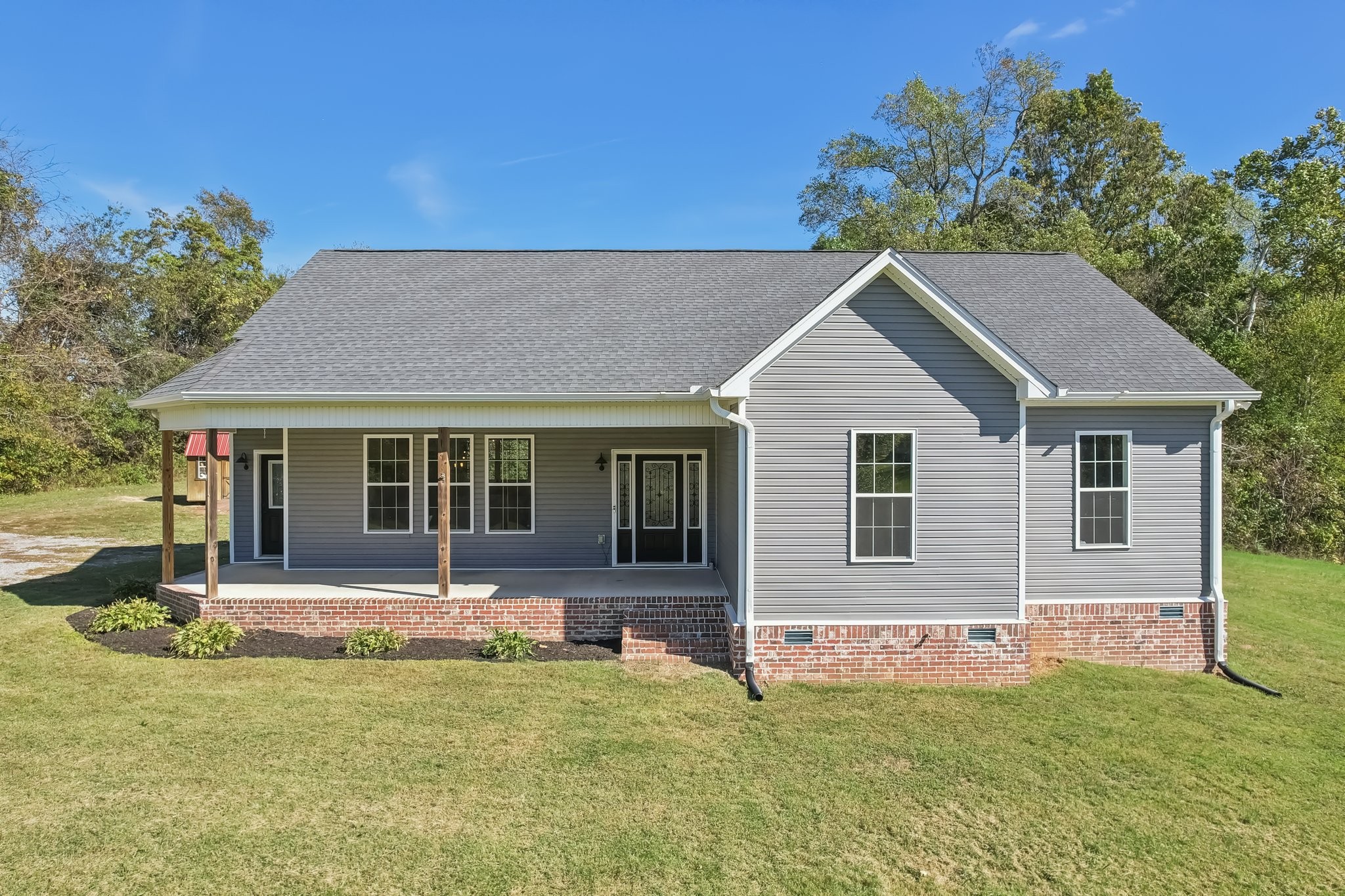 521 Boiling Springs Road Portland, TN 37148 - Photo 1 of 61 a front view of a house with a yard