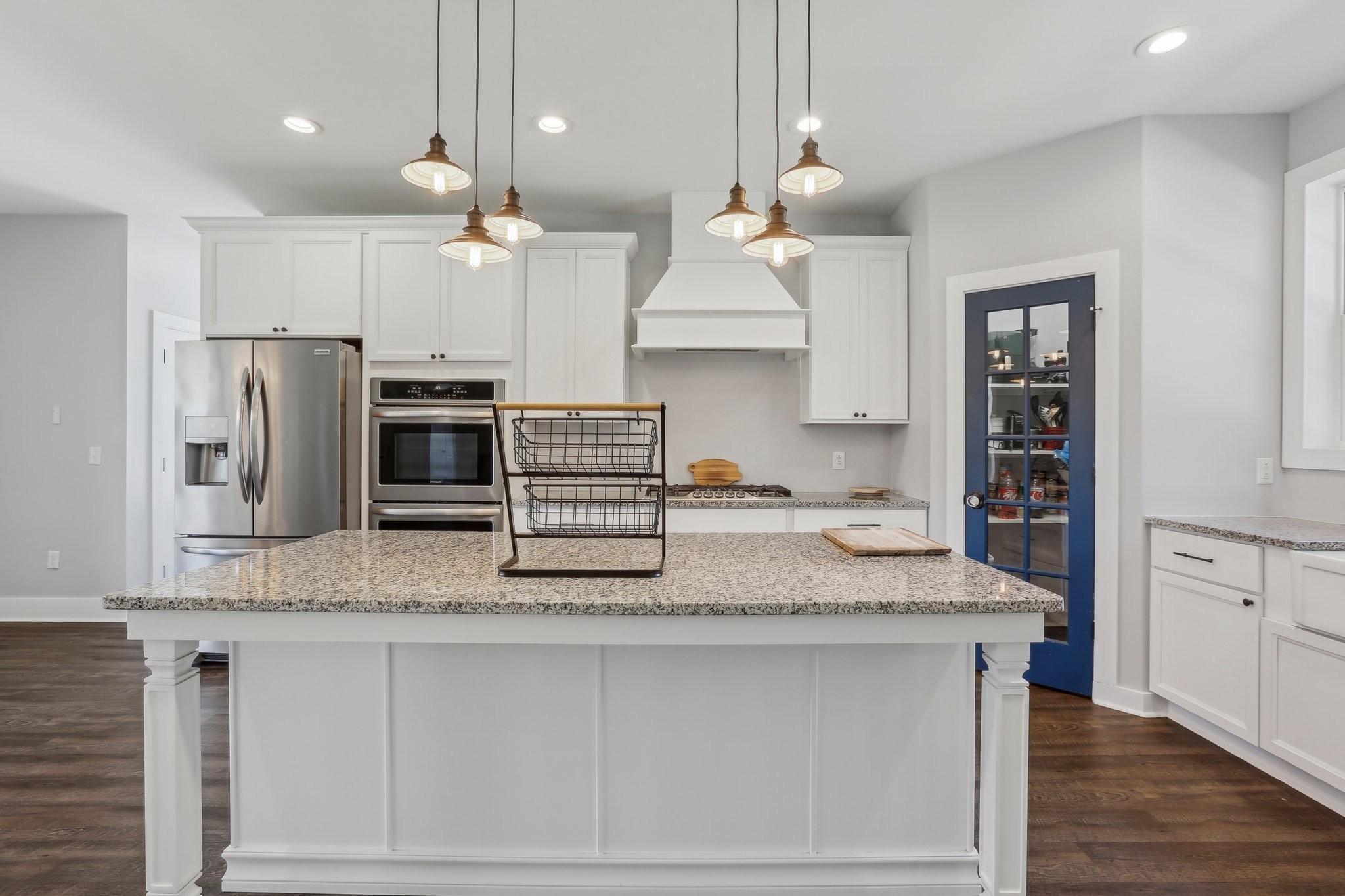 521 Boiling Springs Road Portland, TN 37148 - Photo 25 of 61 a kitchen with stainless steel appliances granite countertop a sink a refrigerator and a stove