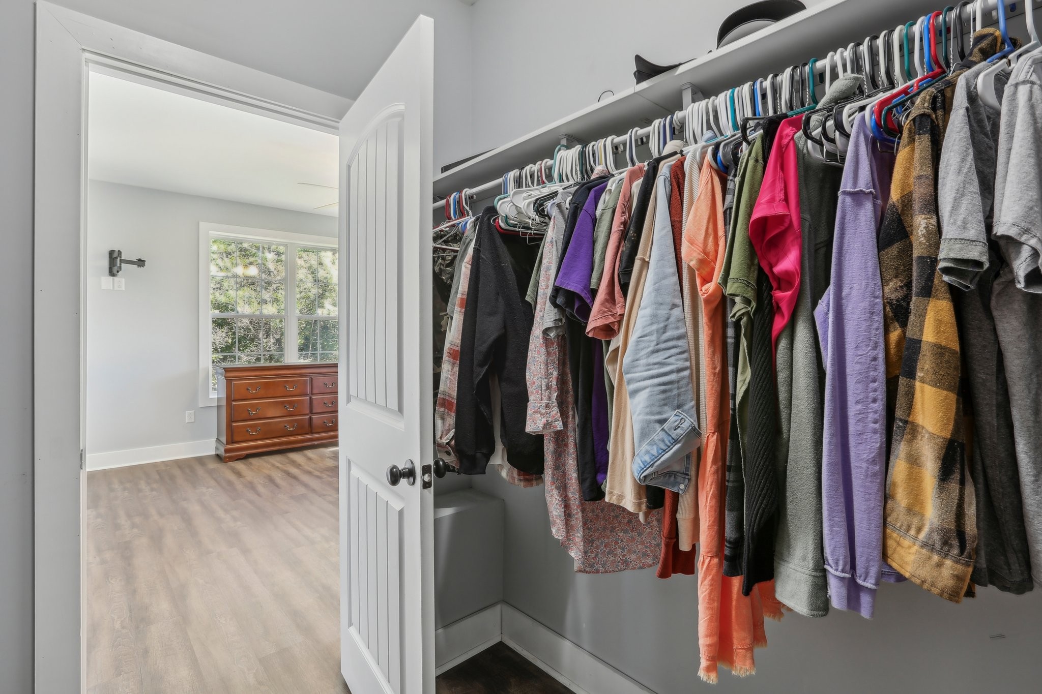 521 Boiling Springs Road Portland, TN 37148 - Photo 27 of 61 a view of walk in closet with clothes and shoes