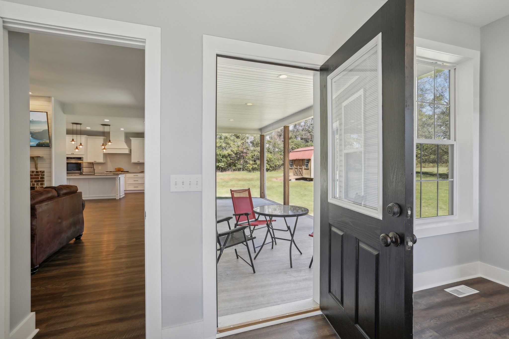 521 Boiling Springs Road Portland, TN 37148 - Photo 43 of 61 a view of a hallway with dining room and furniture