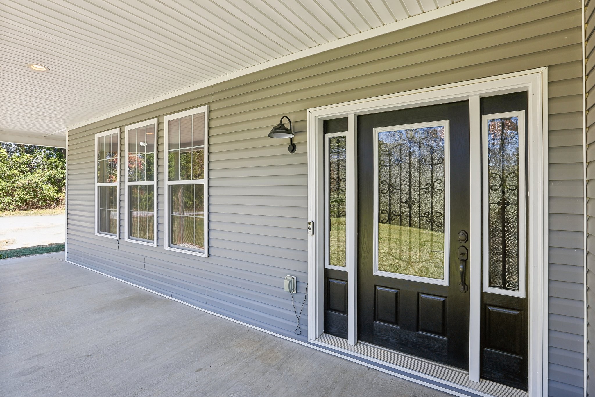 521 Boiling Springs Road Portland, TN 37148 - Photo 5 of 61 a view of an empty room with large windows
