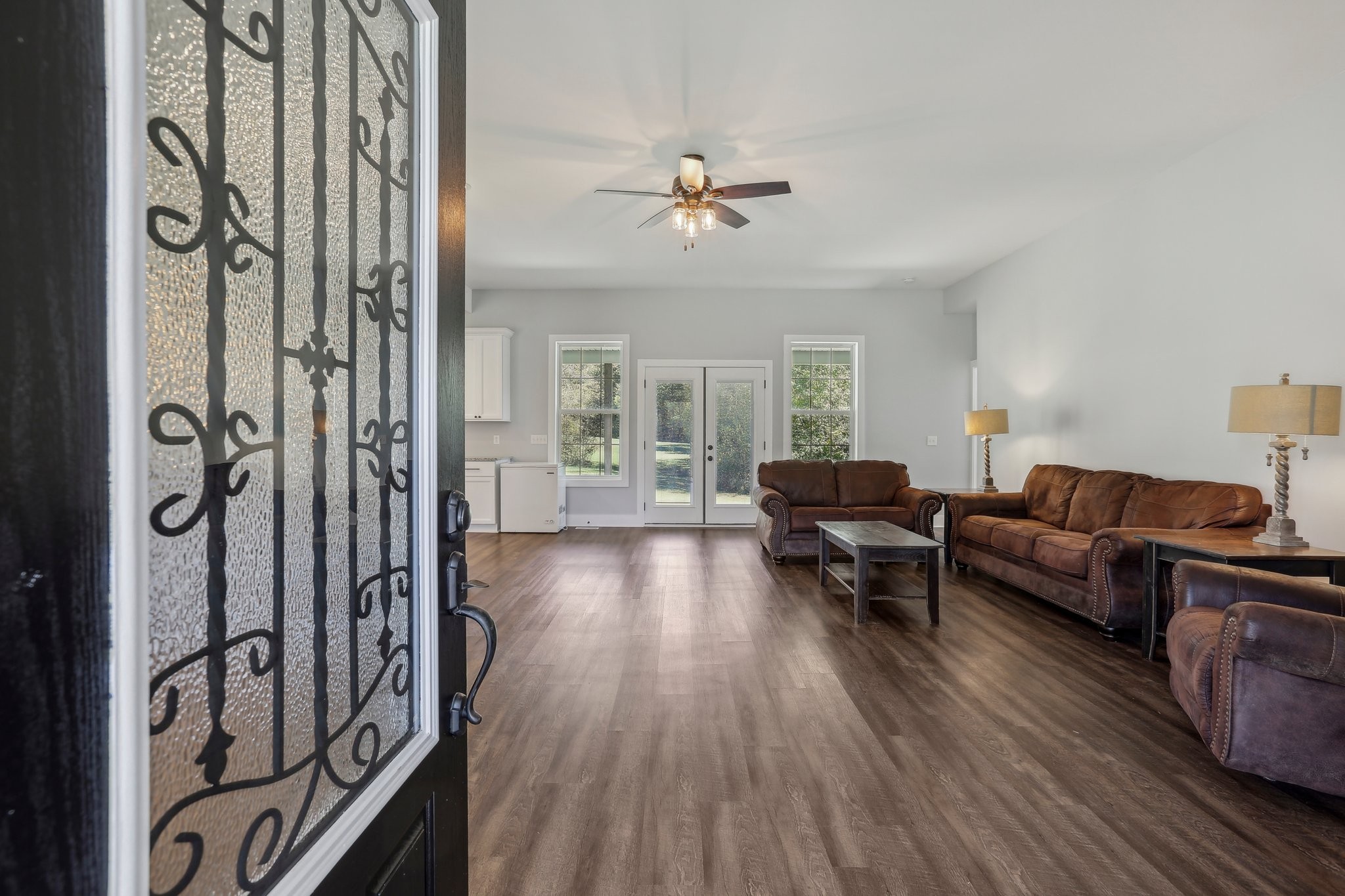 521 Boiling Springs Road Portland, TN 37148 - Photo 6 of 61 a living room with furniture and wooden floor