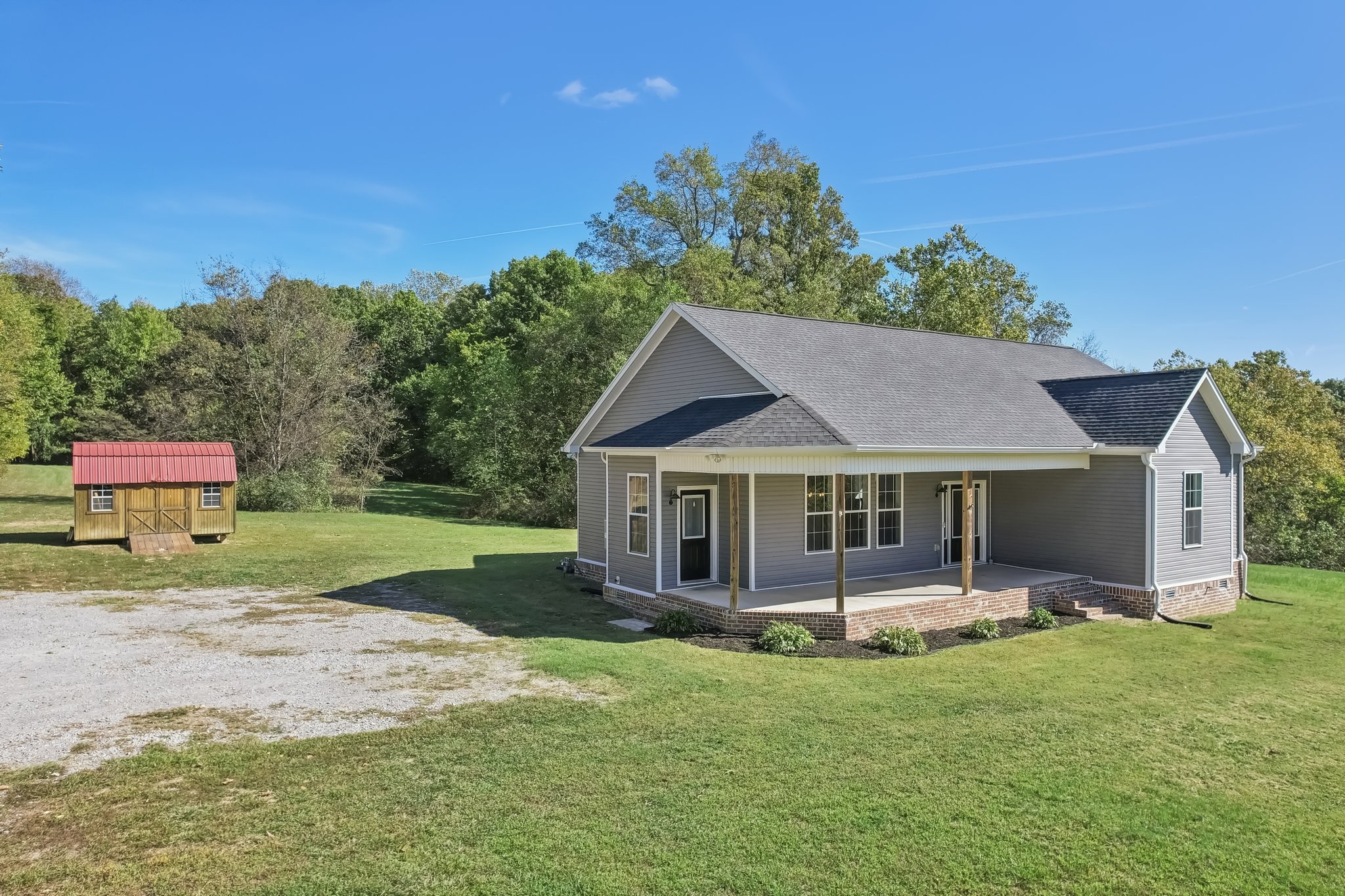 521 Boiling Springs Road Portland, TN 37148 - Photo 61 of 61 a view of a house with backyard and garden