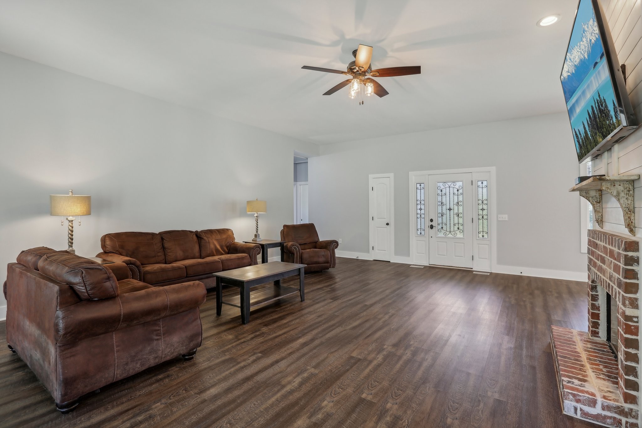 521 Boiling Springs Road Portland, TN 37148 - Photo 10 of 61 a living room with furniture and a wooden floor