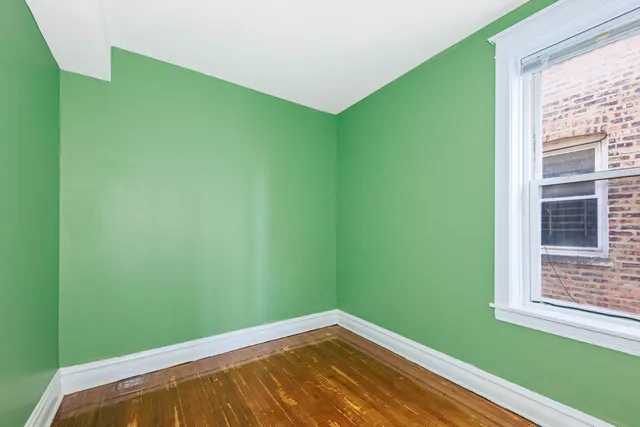 a view of a room that has a window