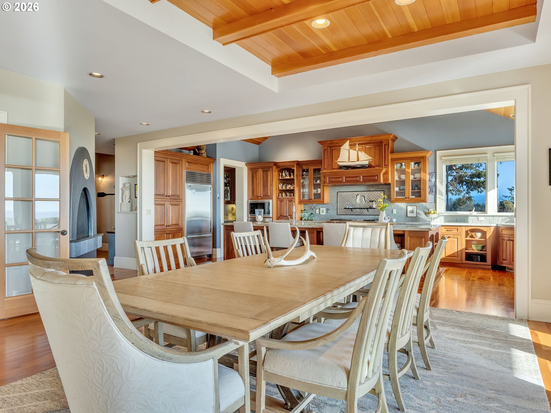 89079 Pinehurst Road Warrenton, OR 97146 - Photo 19 of 46 a dining room with furniture and wooden floor