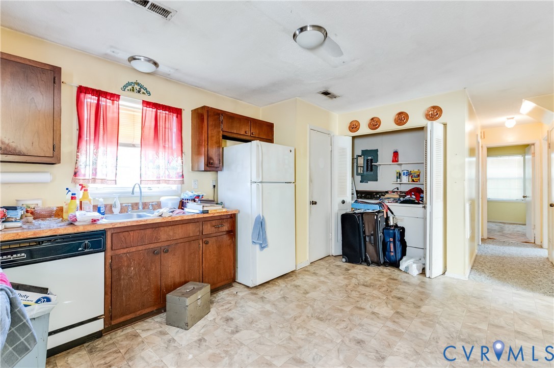1006 Pineville Road North Chesterfield, VA 23236 - Photo 8 of 22 a kitchen that has a lot of appliances and a window