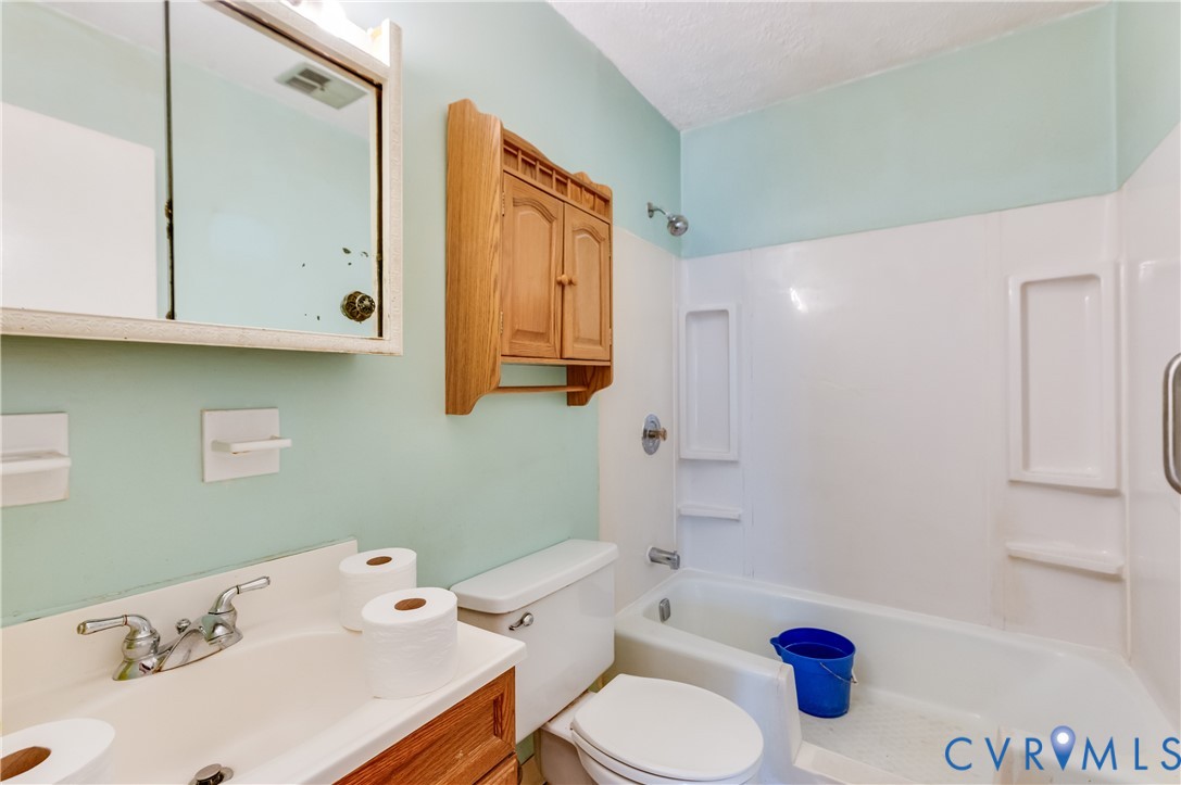 1006 Pineville Road North Chesterfield, VA 23236 - Photo 10 of 22 a bathroom with a sink and a tub