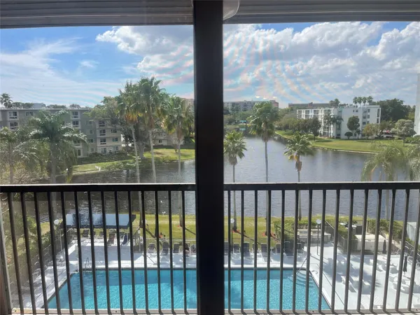 a view of a lake from a balcony