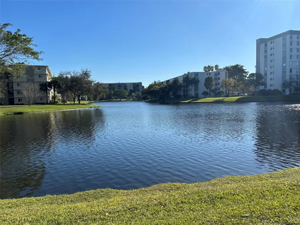 a view of a lake with houses