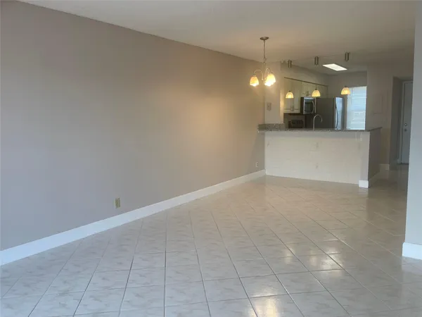 a view of a kitchen with a sink