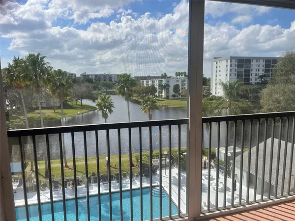 a view of a balcony with an outdoor space