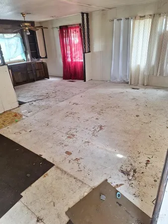 a view of a room with a window