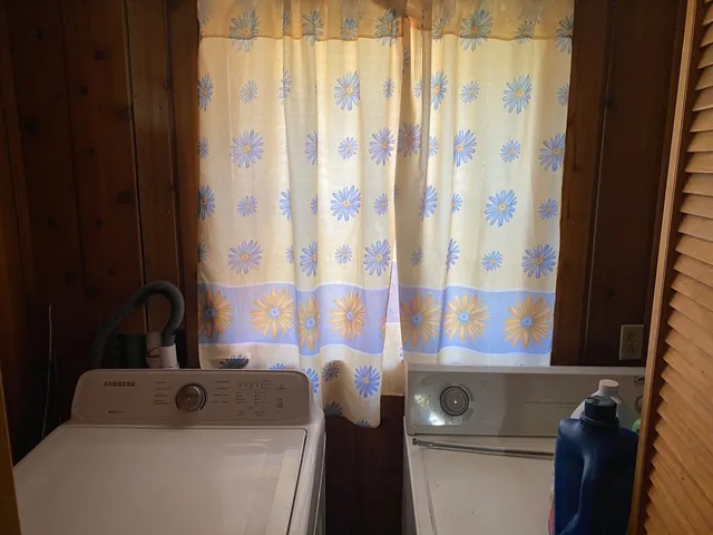 a brick building with a bench in front of it